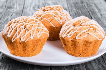 Whole Wheat muffins with raisins, nuts and ginger, close-up