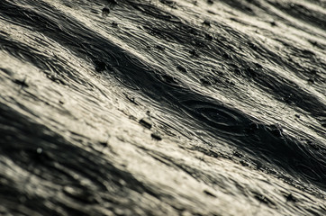 Raindrops on the dark water