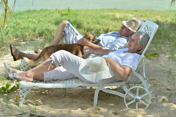 Senior couple relaxing  near hotel resort