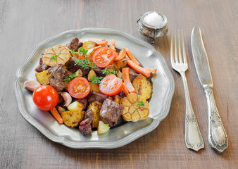 Roast wild game with vegetables