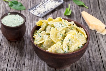 Ravioli filled with ricotta cheese and spinach, close-up