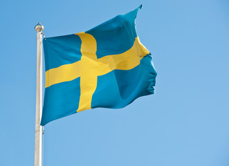 Flag of Sweden against blue sky
