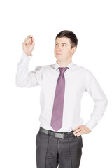 portrait of young business man writing something on glass board