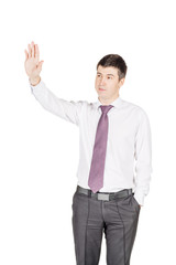portrait of young business man waving to his colleague. isolated on white background