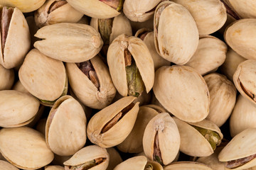 Pistachio nuts arranges as background