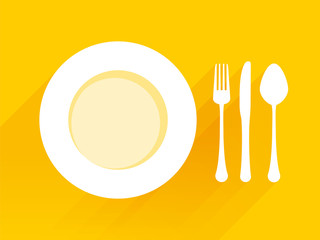 Plate with spoon knife fork on a yellow background