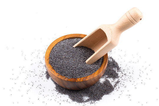 poppy seeds in a wooden bowl