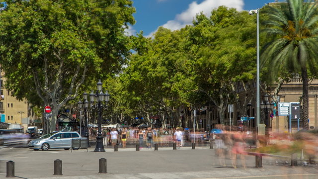 The famous Ramblas street timelapse with unidentified walking tourists in Barcelona, Spain