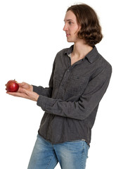 Young man holds out an apple