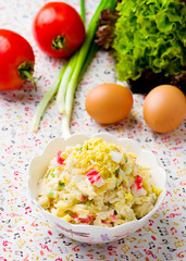 crabsticks and mayonnaise salad. selective focus