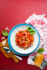 Healthy vegetarian Italian pasta on bright background
