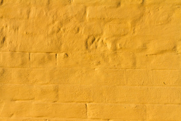 Brick and plaster background.
