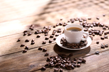 Cup of coffee on wooden table