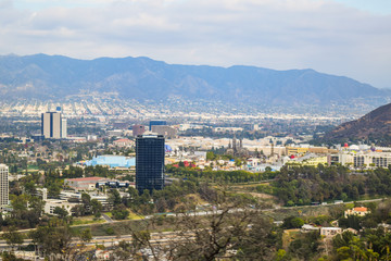 Good sunny day in downtown Los Angeles, California. Aerial view of Los angeles city from Runyon...