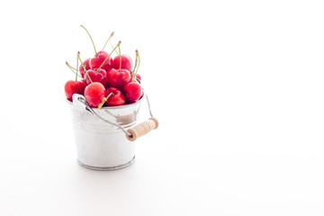 Ripe red cherry berries with white background