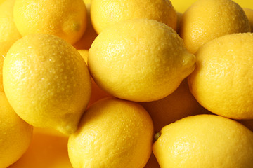 Wet lemons as background
