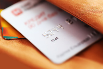 Credit card in pocket of pants, closeup