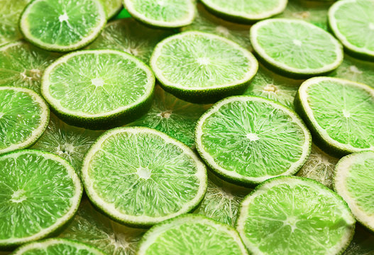 Green background of sliced lime