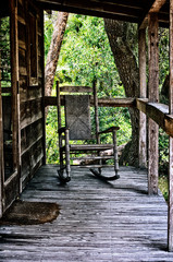 old rocking chair on porch of house
