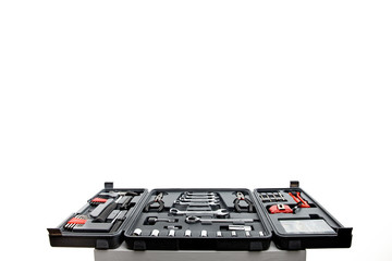 Black toolbox with different instruments isolated on white