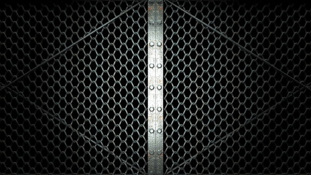 Wire Mesh Gates That Is Spotlighted On Black Background