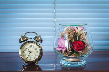Vintage style with old alarm clock of life.
