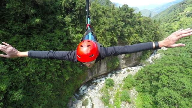 Experience the thrill of adult men riding a zipline with stunning camera footage and audio,capturing every exhilarating moment.