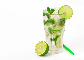 mojito cocktail with lime and mint in tumbler glass