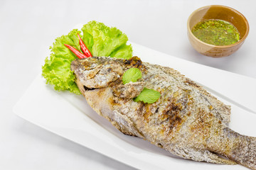 fish grilled with salt on background,Thai food