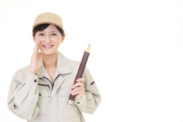 声援を送る女性作業員