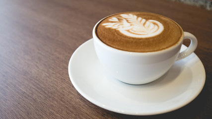 Coffee cup and latte art.