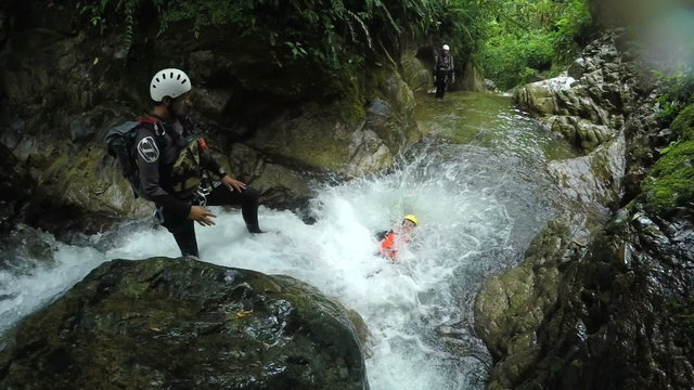 Experience the breathtaking slow motion dive of a young adult into a mountain river,beautifully captured and converted from 120fps for an immersive adventure.