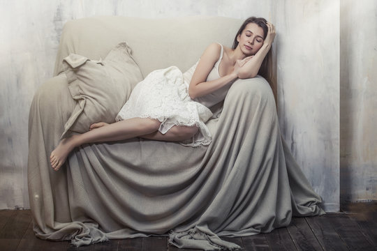 Beautiful Young Slim Woman Sleeping In A Huge Comfortable Chair