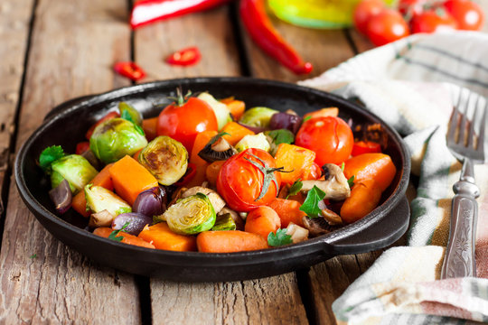 roasted vegetables in a cast iron pan