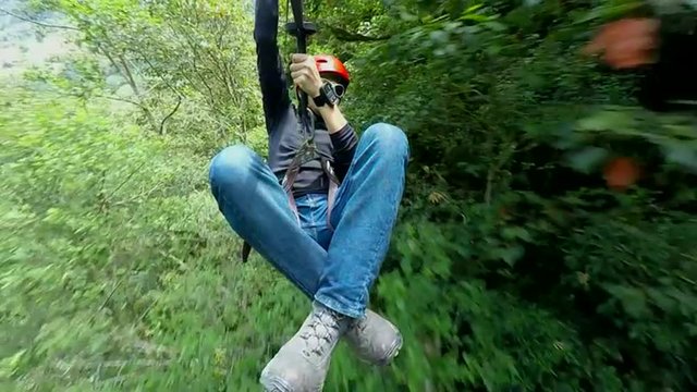 Capture thrilling moments of adult men riding a zipline with our high quality camera mounted on the cable,ensuring unforgettable memories.