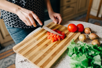 Girl is preparing salad, healthy food