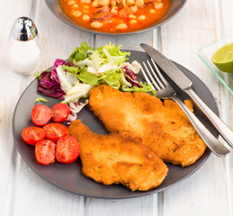 breaded fillets with salad