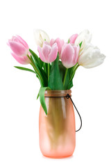 beautiful tulips in a stylish vase with water isolated on white background
