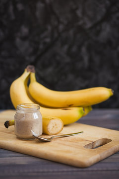 Children's meal of mashed banana in a glass jar