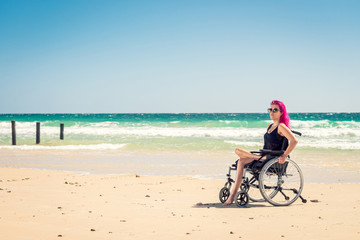 Disabled woman at the beach