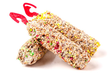 Food for parrots isolated on white background