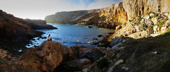Fototapeta na wymiar Cliffs at South West shore of Portugal, Algarve, near Sagres and Cape Saint Vincent