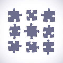Set of puzzle pieces in a flat design, vector illustration