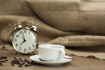 Coffee cup against a rustic background