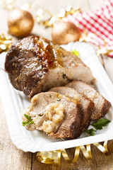 Baked meat roulade with apple sauce