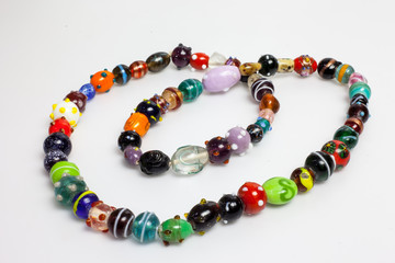 Necklace made ​​of beads and multi-colored hand-made .