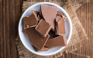 Milk Chocolate on wooden background