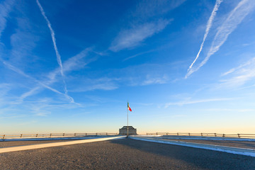 Italian flag on blue sky