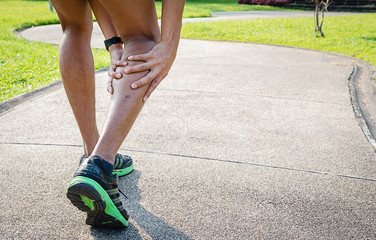 Male runner with muscle pain in right leg, Leg calf sport muscle