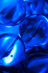 Blue glass balls as texture or background.